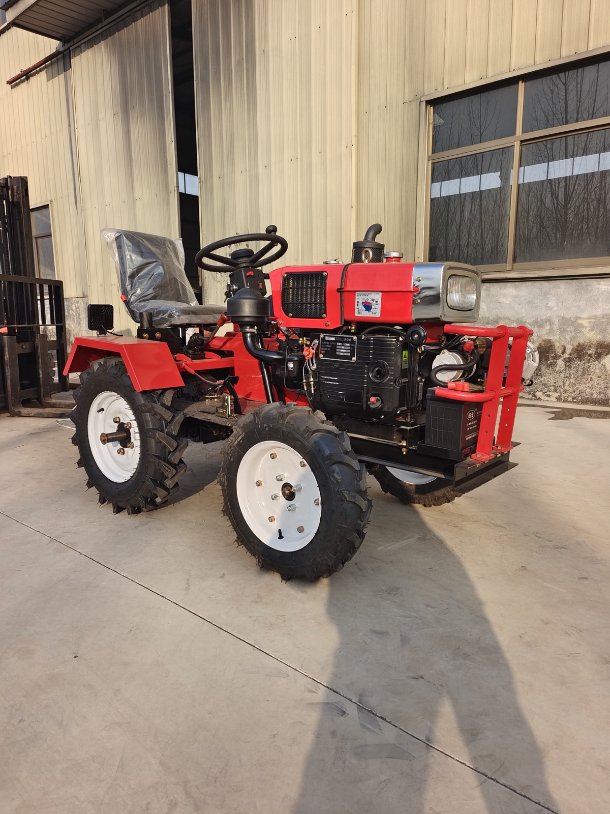 Mini four-wheel tractor for orchard greenhouse and small plot seasonal farm work