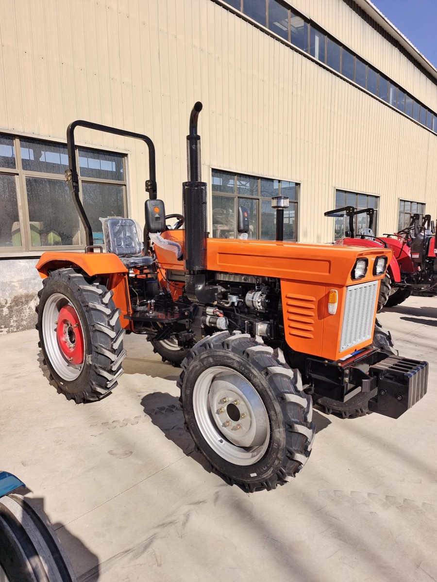 TS Series wheeled tractor front angle with compact body and agricultural tires