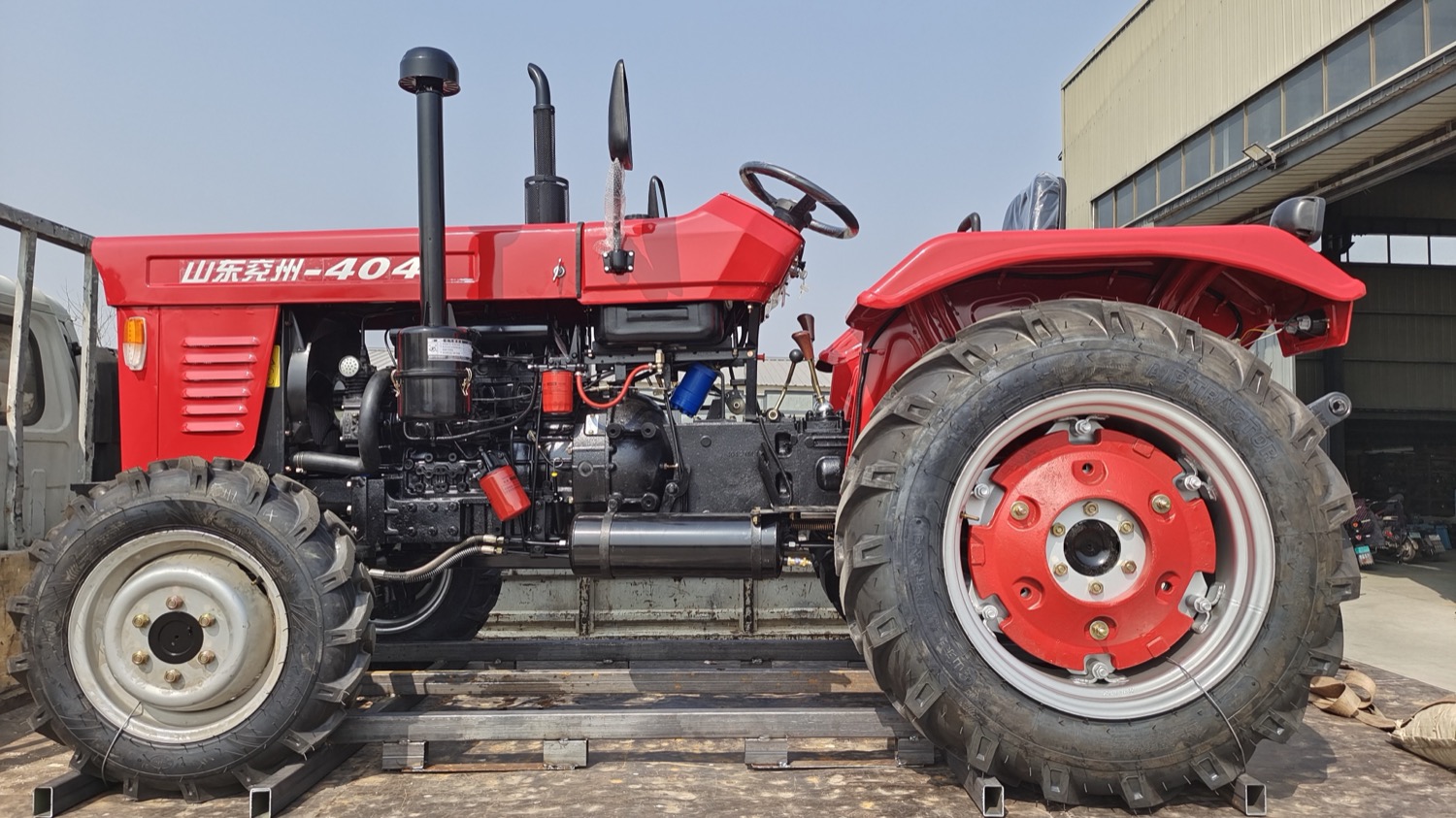 Huaxiang TS404 tractor loaded for export transport