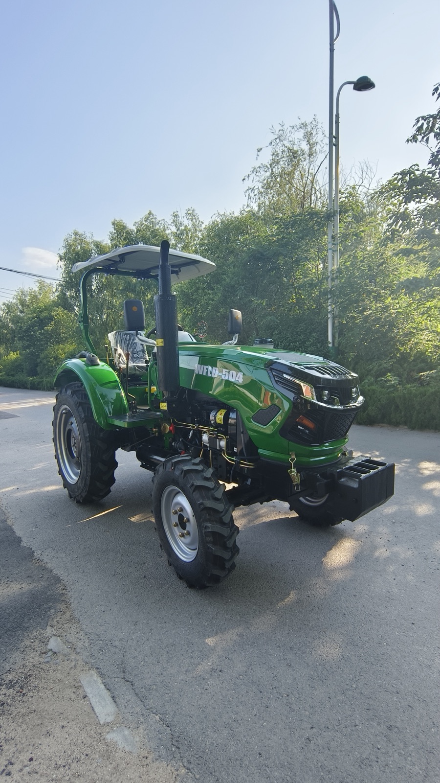 TYE504 style wheeled tractor for field farm seasonal operations